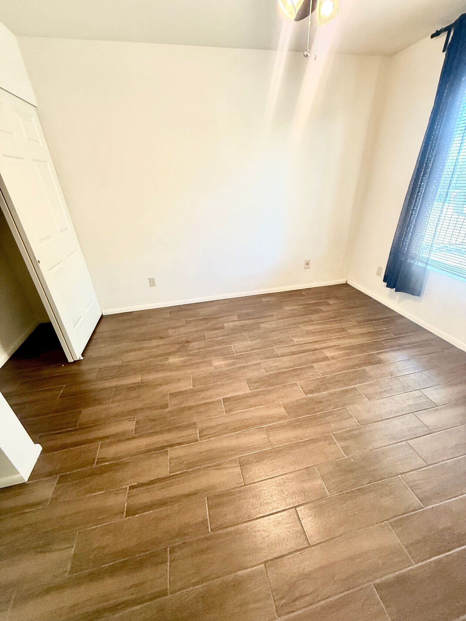 2nd bedroom with closet and ceiling fan - 200 E Belcourte Pl