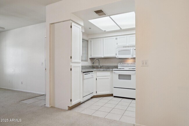 Building Photo - 9450 E Becker Ln