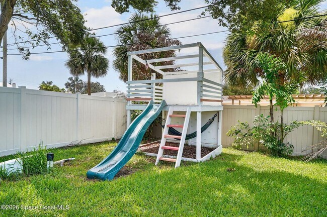 Building Photo - Welcome to this beautifully remodeled 4-bedroom, 3-bath home in the heart of Indialantic Beach!