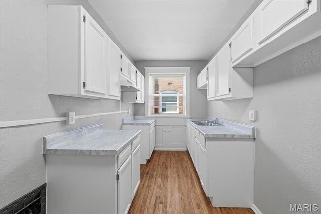 Building Photo - 4643 Evans Ave