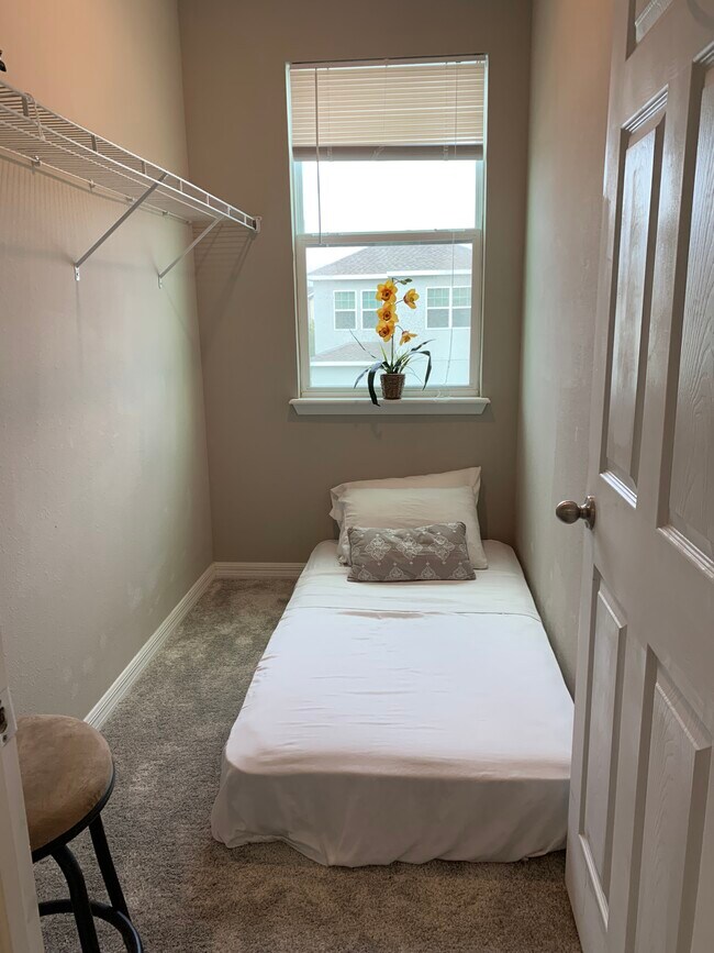 Walk in closet is big enough to fit an extra twin size mattress for guests. - 8365 Lookout Pointe Dr