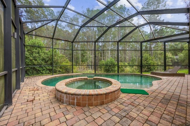 Building Photo - Luxury Living in Amelia National – Resort-...