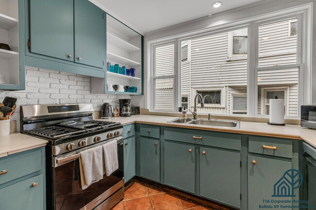 Building Photo - Furnished 4-Bedroom, 2.5-Bath Apartment near Elmwood Village