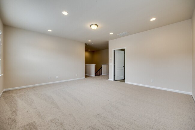 Building Photo - "Spacious 4-Bedroom Retreat with 3 Full Ba...