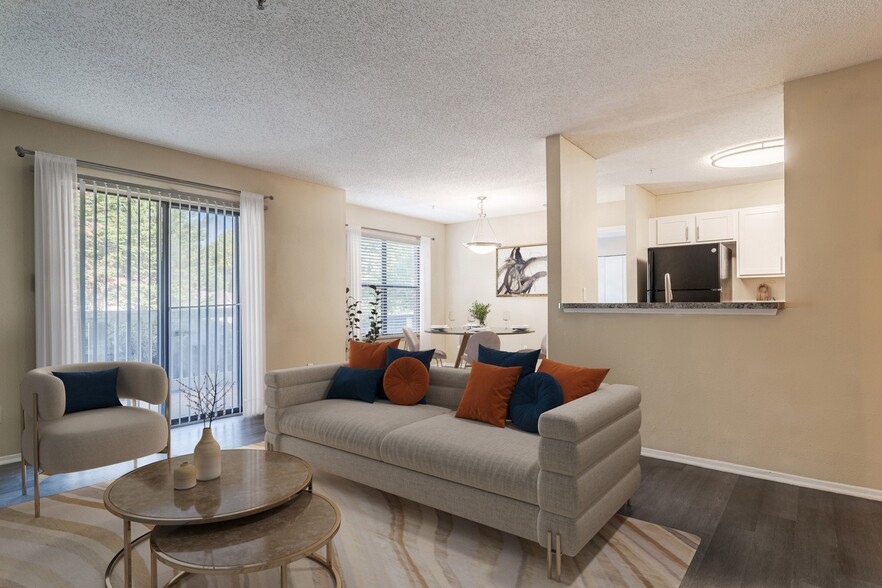 Spacious Living Room - The 1800 at Barrett Lakes Apartments