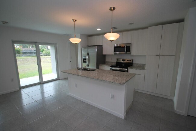 Building Photo - Stunning 4BR/2BA Palm Bay Retreat with Modern Upgrades & Oversized Lot!!