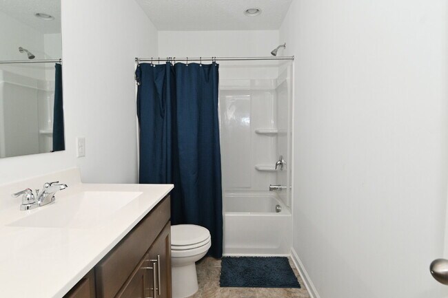 Building Photo - "Spacious 5-Bedroom Retreat with Luxurious Quartz Countertops & Fireplace on Deerberg Drive!"