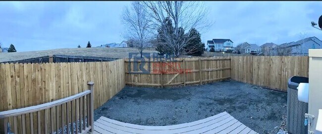 Building Photo - 2116 E 103rd Ave