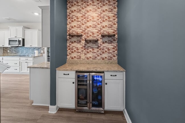 Building Photo - Spacious 5-Bedroom Home in The Palms at New Hampstead with Office & Screened Porch