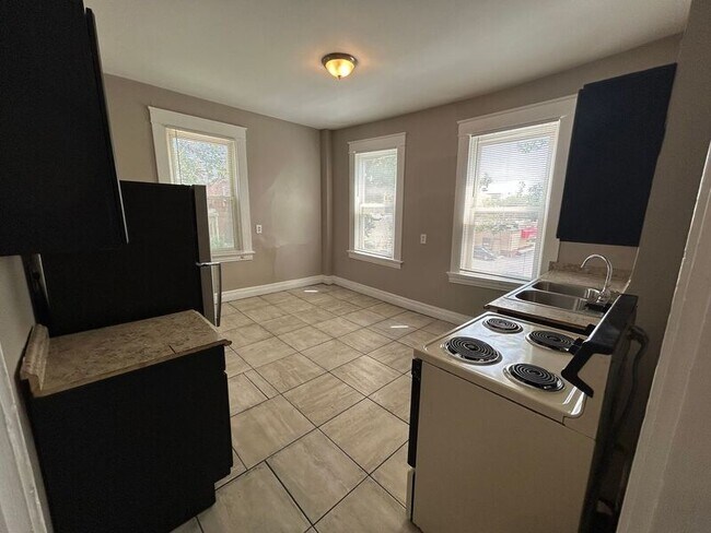 Building Photo - 1214 Iliff Ave