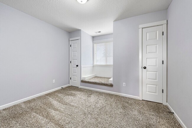Building Photo - Custom-Built 4BR/2.5BA Two-Story Near Woodstock — Quartz Island Kitchen, Gas Fireplace & Fenced Y...