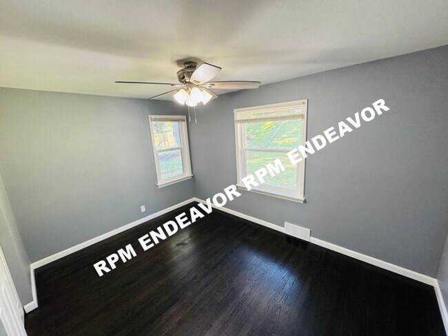Building Photo - "Charming 4-Bedroom Haven with Sunroom, Ha...