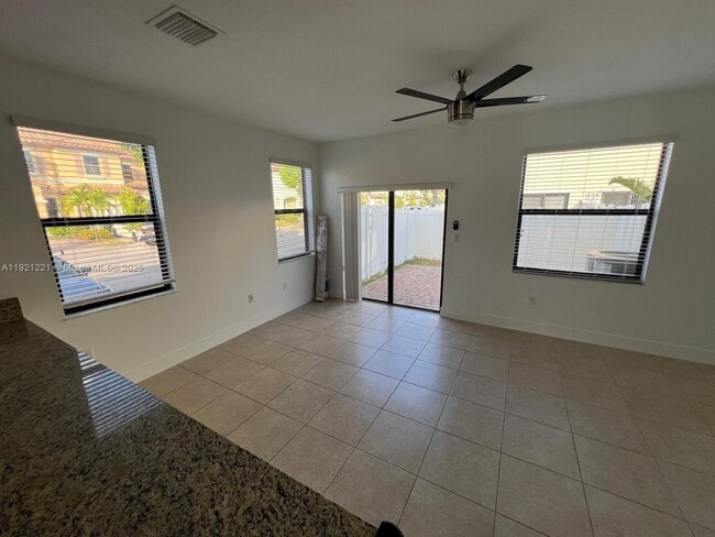 Building Photo - 9399 W 33rd Ln