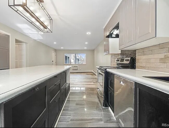 Building Photo - Available Now!  "Spacious 3-Bed, 2-Bath Co...