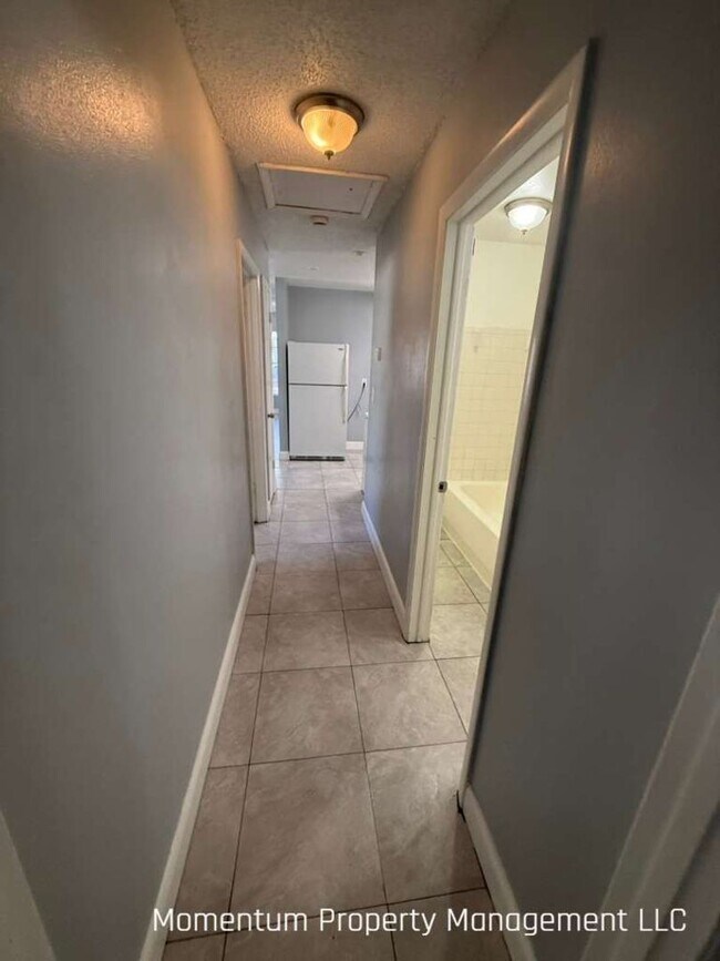 Building Photo - Newly Remodeled 2/1 Duplex- AVAILABLE FOR IMMEDIATE MOVE IN!!