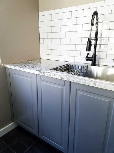 Brand new kitchen with granite countertops, 8 ft island, stainless steel appliances, open shelving - 1008 Manor Ln