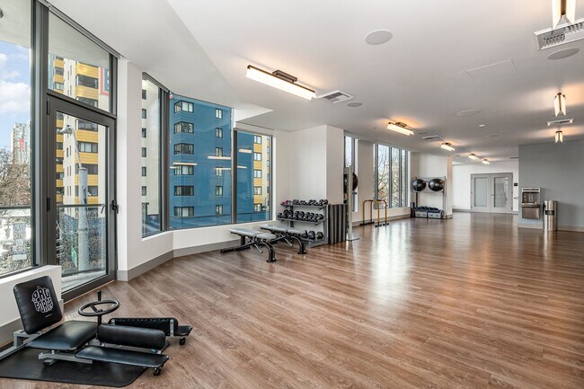 Building Photo - Urban Oasis at Spire Condominiums – Modern...