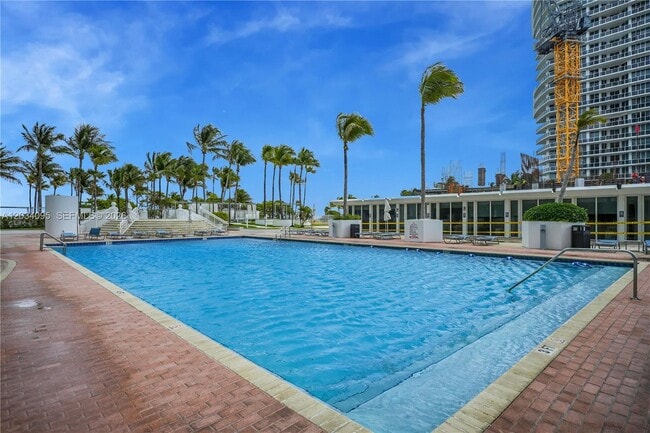 Building Photo - 10275 Collins Ave