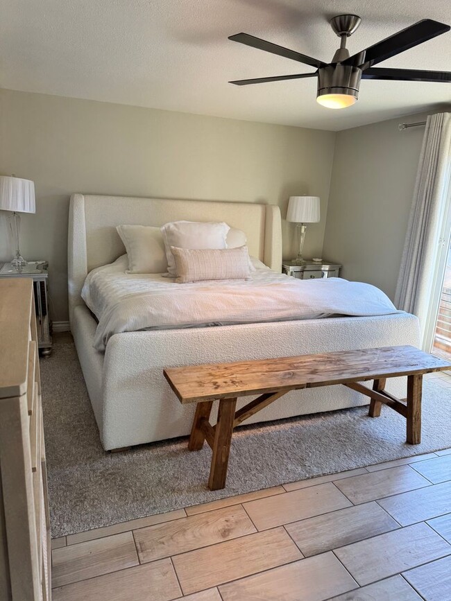 Building Photo - Charming 2-Bedroom, 1.5-Bath Apartment with Private Yard and 1 Car Garage