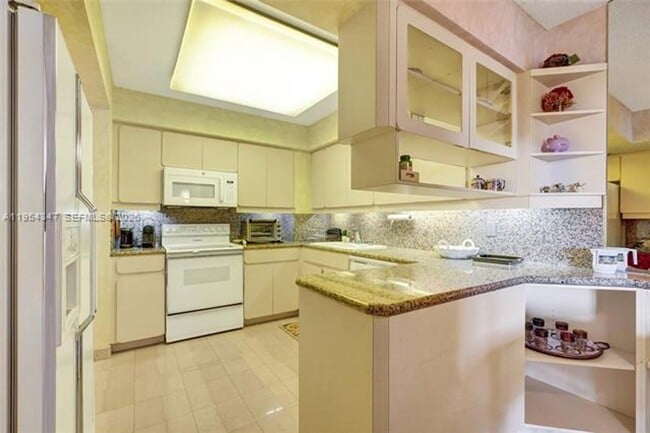 Building Photo - 9801 Collins Ave