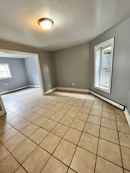 131 W 54th Bsmt - 133 W 54th St