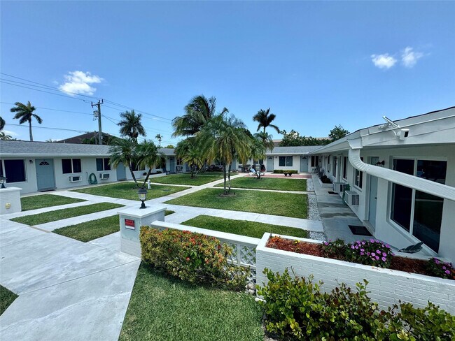 Building Photo - 120 NE 10th Ave