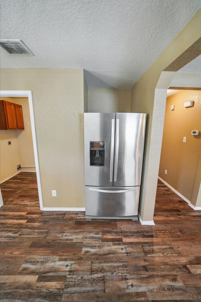 Building Photo - Energy-Smart Single-Story Now Available in...