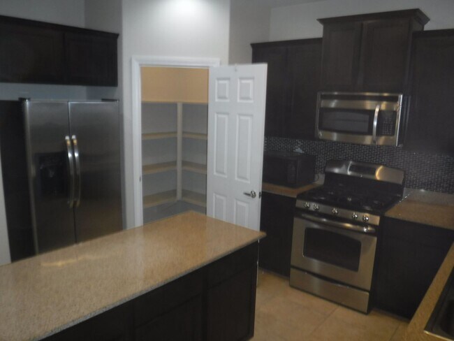 Building Photo - SPACIOUS 4 BEDROOM HOME WITH 2.5 BATHS, 2 ...
