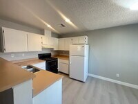 Building Photo - First month's rent 1/2 off!  2 Bed / 1 Bath open floor plan with new LVP and private washer/dryer!