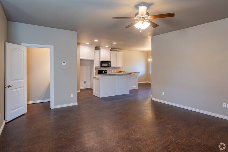 4BR, 2.5BA - 2050SF - Living, Dining Room - The Commons at Greenlea Chase