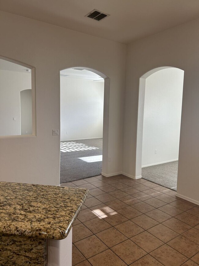 Building Photo - Unfurnished four bedroom large home!  Three car garage