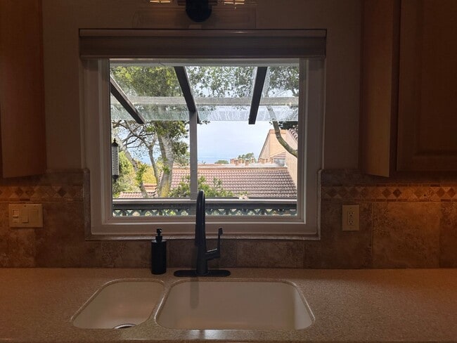 Building Photo - Sunny - Fully Furnished 2-Bedroom, with Office and 2 1/2 bathrooms.