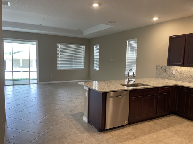 Living room / dining area - 7781 SW 57th Pl