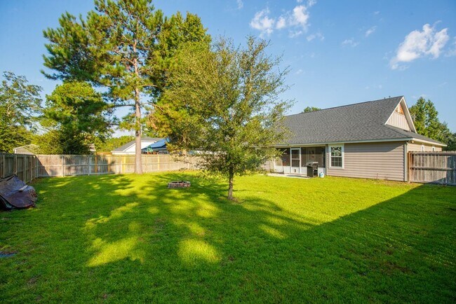 Building Photo - Modern 4-Bedroom Home with Screened Porch ...