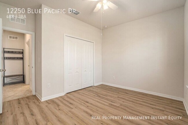 Building Photo - 12250 Blue Pacific Dr