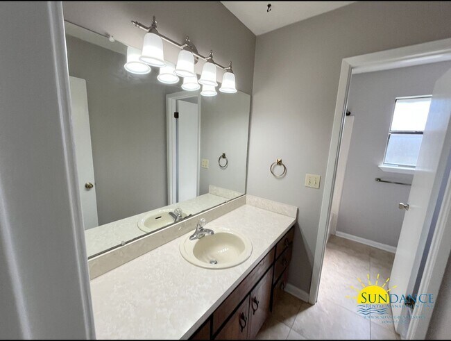 Building Photo - Charming 3-Bedroom Brick Home in Bluewater Bay Community, Caribbean East