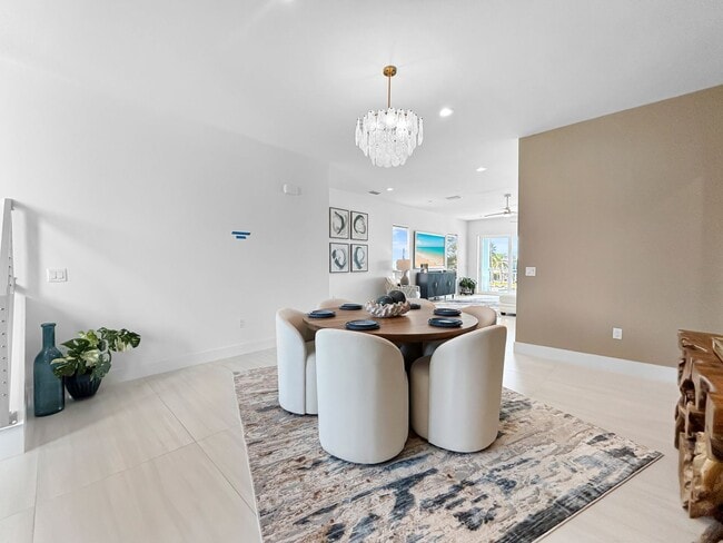 Building Photo - Waterfront Johns Pass Luxury | Steps to Beach + Pool, Hot Tub & Dock