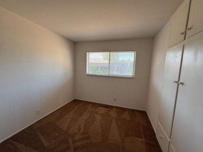 Building Photo - Single level 4 bedroom, 2  bath home – mov...