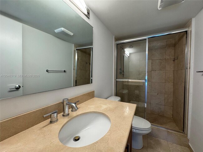Building Photo - 10275 Collins Ave