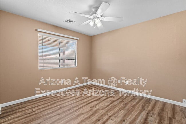 Building Photo - 8969 E Martha Root Ct