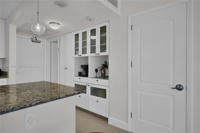 Building Photo - 10275 Collins Ave