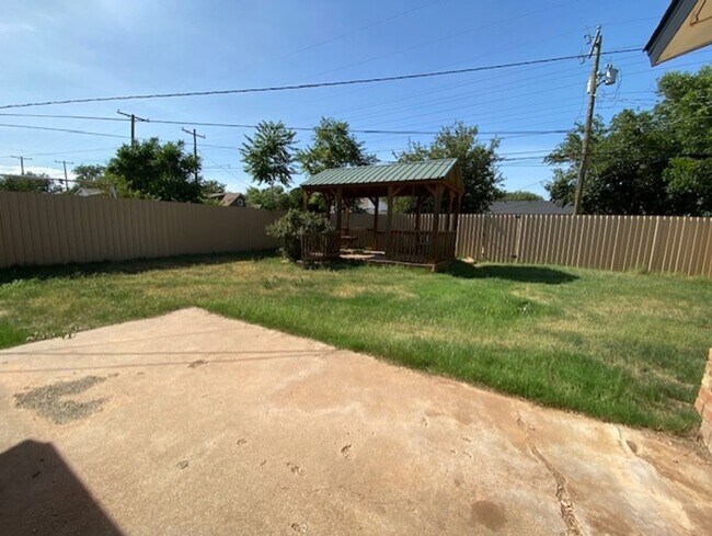 Building Photo - updated 3/2 with carport