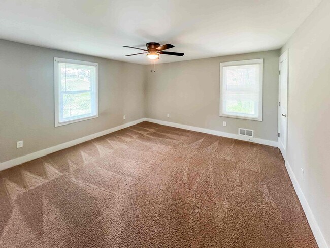 Building Photo - Completely Renovated 3 BR/3 BA Ranch with ...