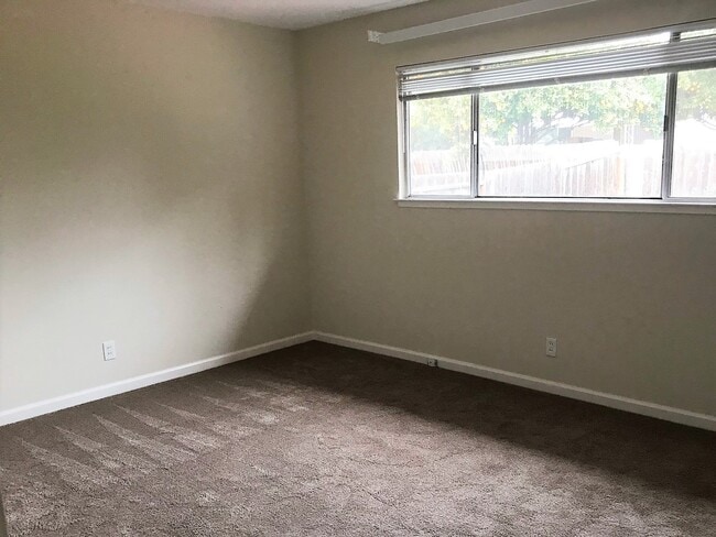 Building Photo - Home adjacent to park with new paint and n...