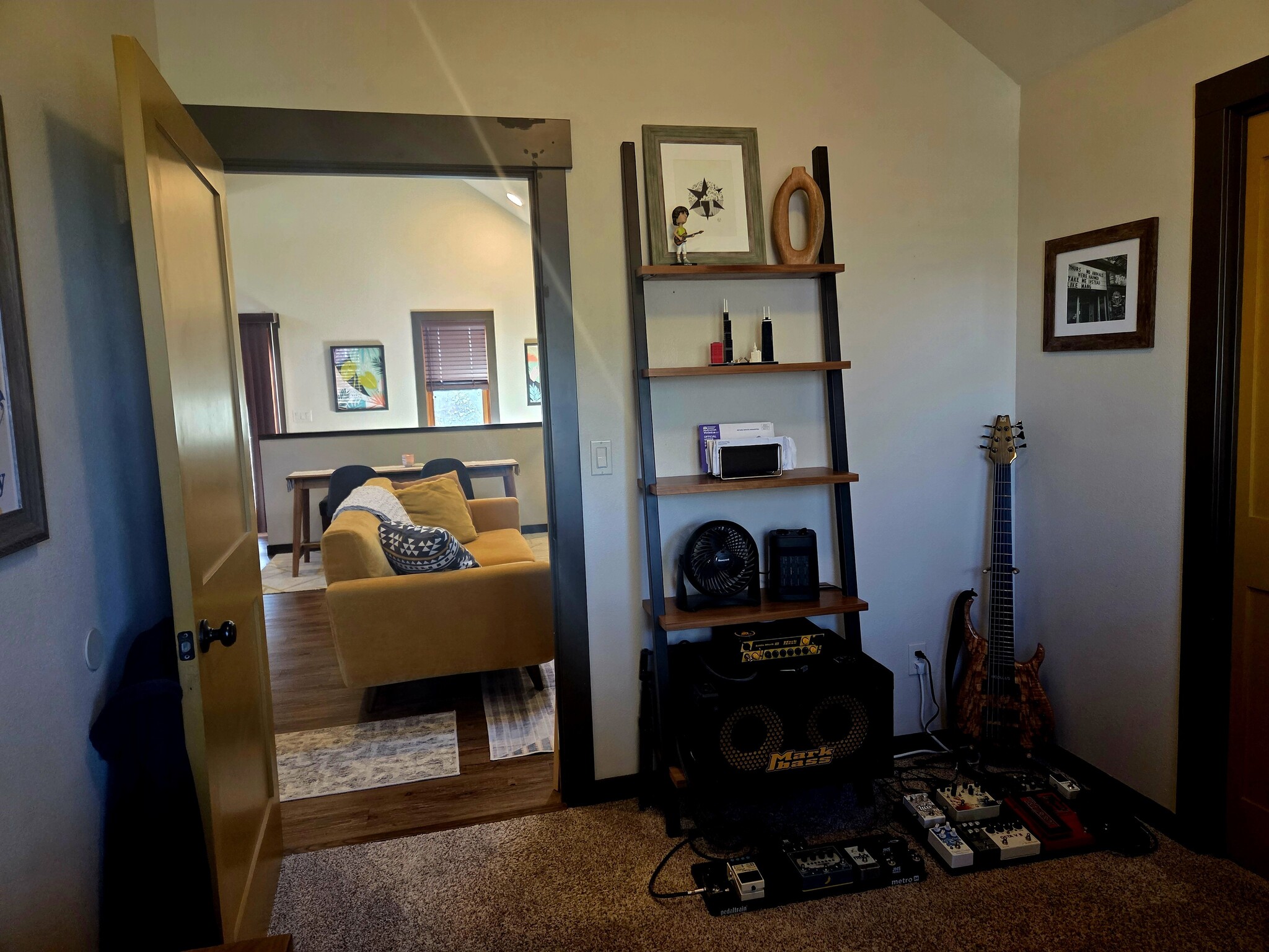 View from bed/office to living room as set up by previous tenant. - 6864 Ne Oregon St