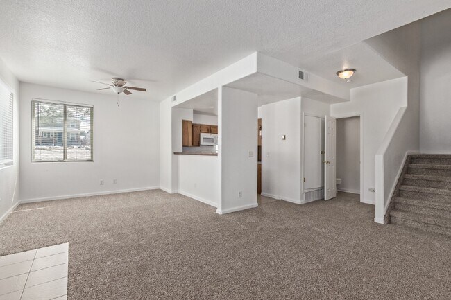 Building Photo - Spacious open plan three bed two bath townhome for rent