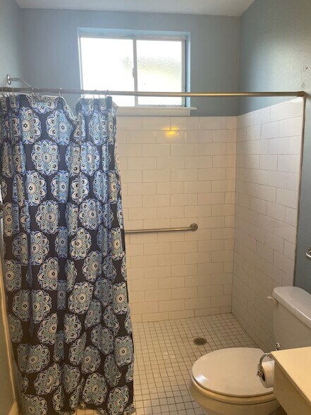 Downstairs bathroom has walk-in shower - 8226 Cohn St