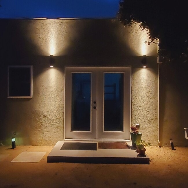 Exterior at night - 8973 W 24th St