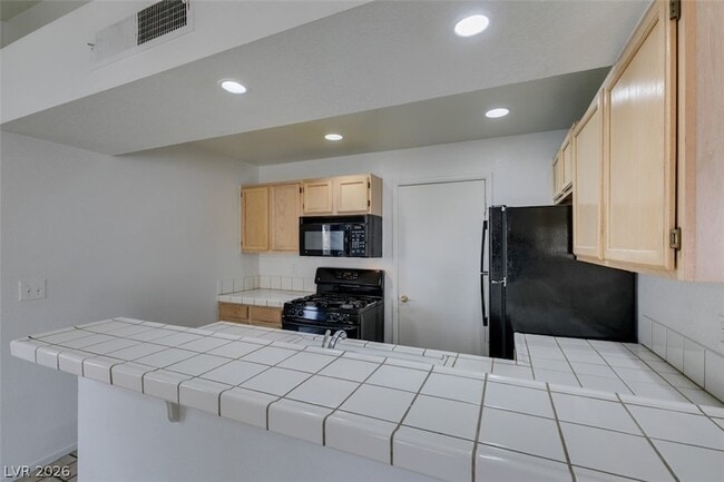 Building Photo - 7570 W Flamingo Rd