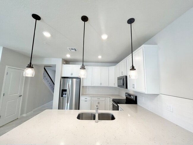 Building Photo - Brand New 4/3 Modern Townhome with a Priva...